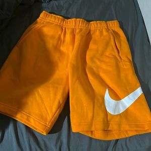 Nike shorts, orange, medium